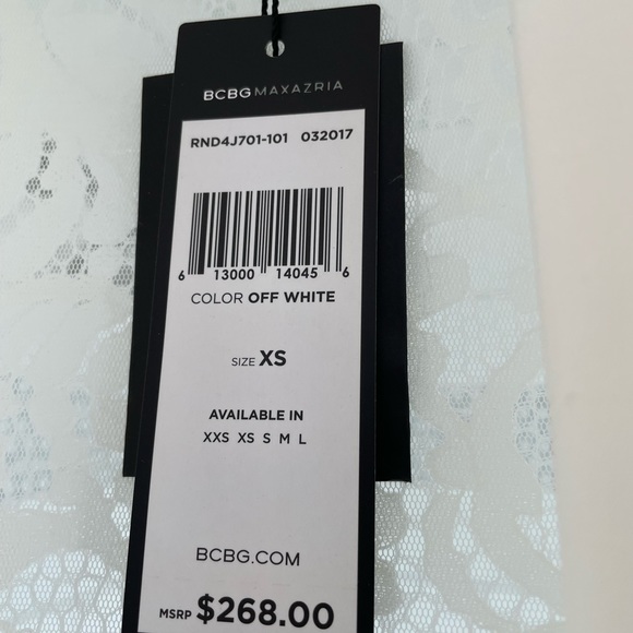 BCBG MaxAzria off white top with lace cut off sleeves. NWT. - Picture 4 of 8